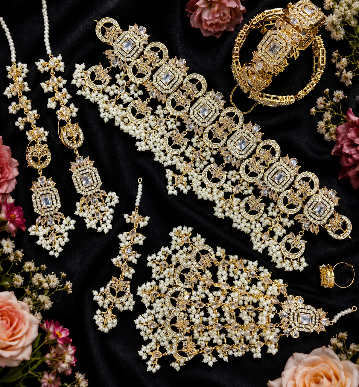 An ornate gold and pearl jewelry set.