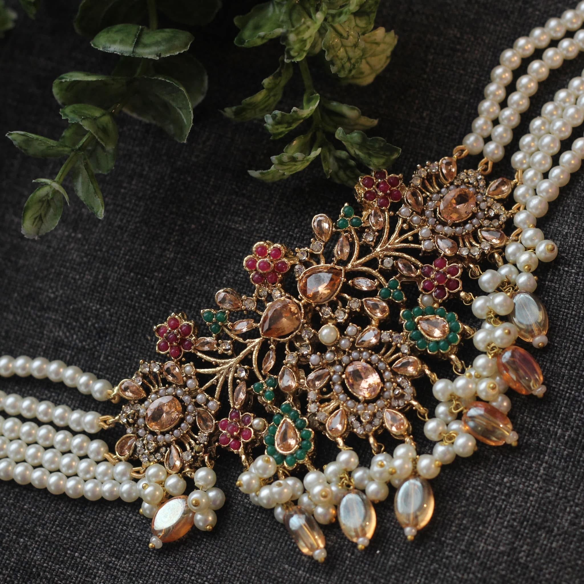 Gold choker set with jhumka.