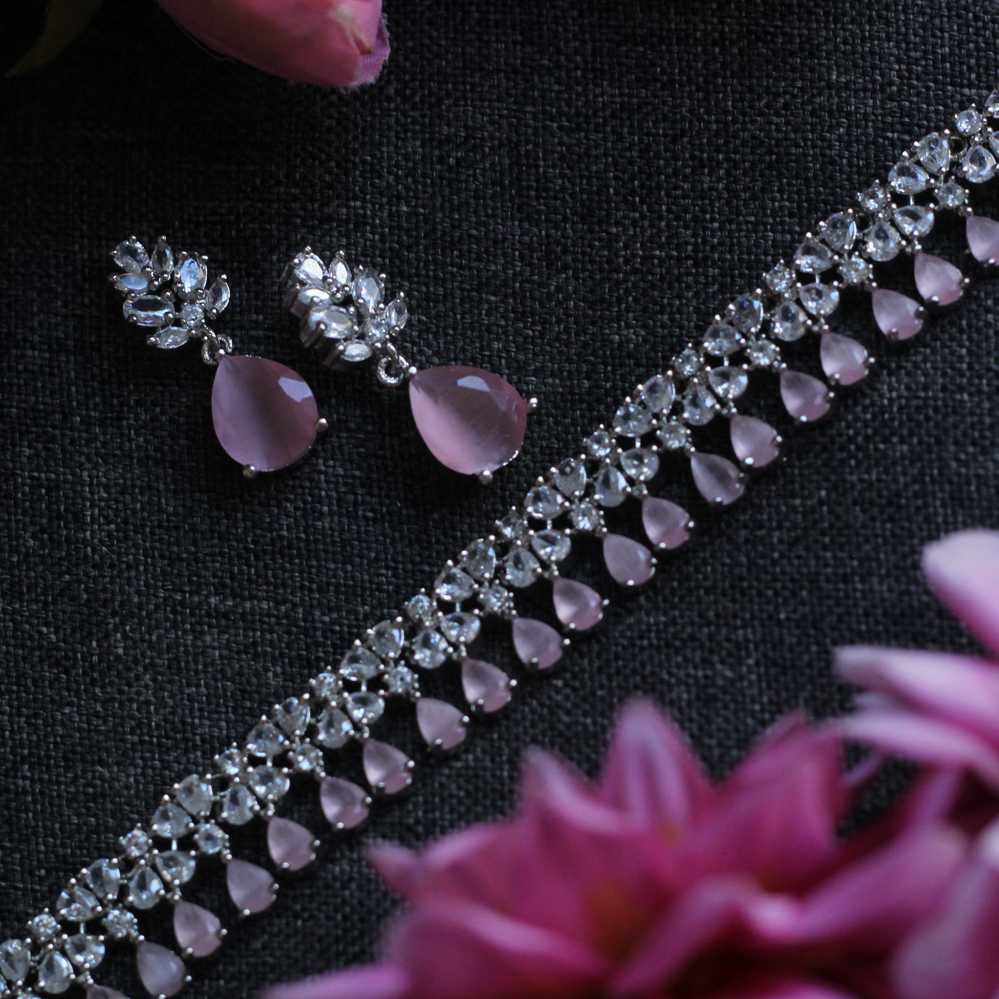 Jewelry set with pink stones and silver accents